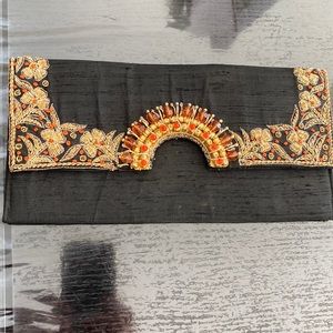 Black & gold raw silk zardozi embroidered clutch with orange & gold beads!